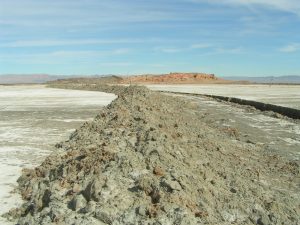 A photo of an under-construction berm on the southeast shore of the Salton Sea. The berm is being built as part of a Federal project to create shallow-water habitat near Red Hill Marina. Photo by the Sonny Bonon National Wildlife Refuge